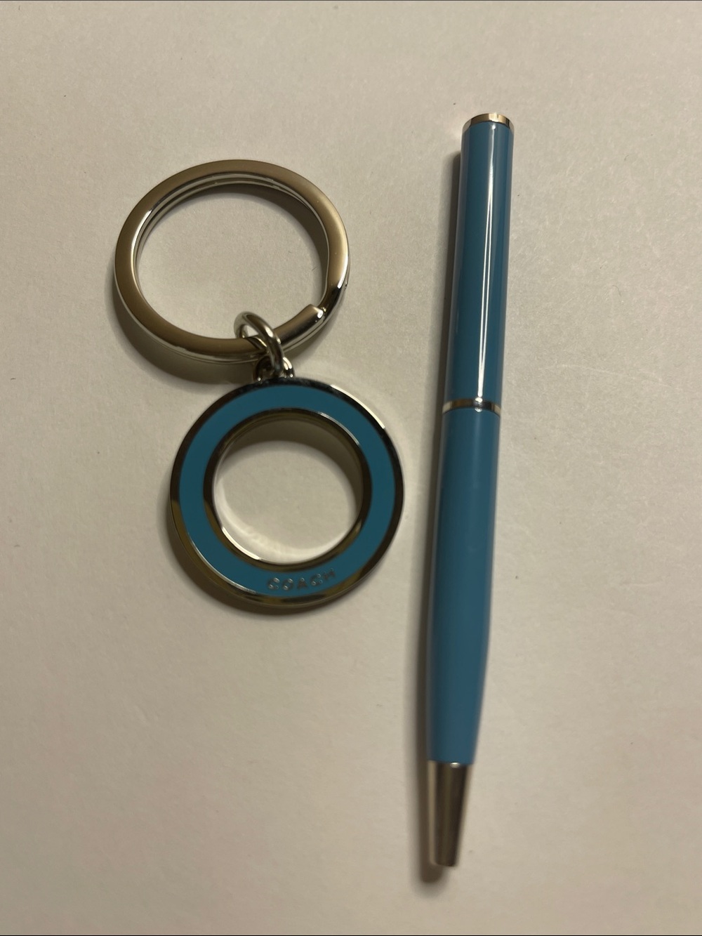 Coach Blue Enamel Circle Keyring and Coach Pen
